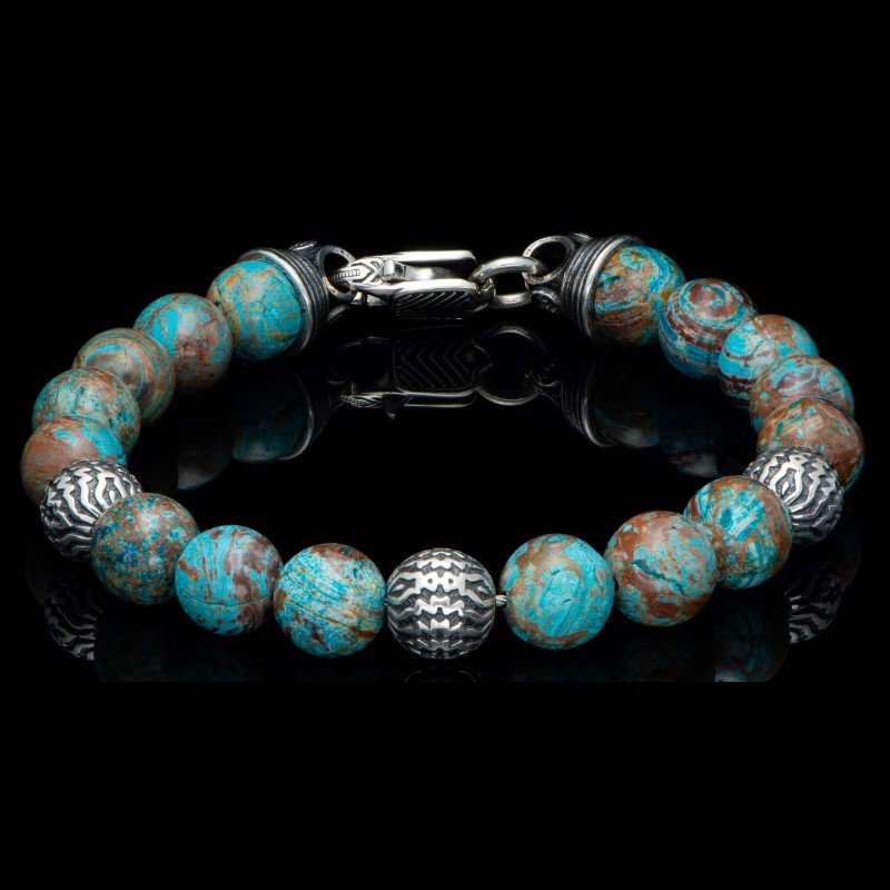 William Henry Seaside Blue Agate Bracelet Featuring  Three Finely Sculpted Beads In Sterling Silver Are Surrounded By The Cool Earth Tones Of Blue Lace Agate  All Threaded Onto Our Welded Stainless Steel Aircraft Cable For Durability